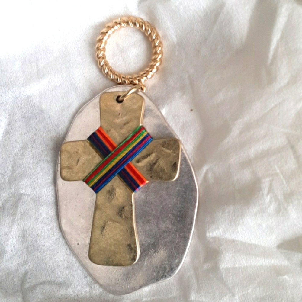 Crux pendant with cross and  silver flate.